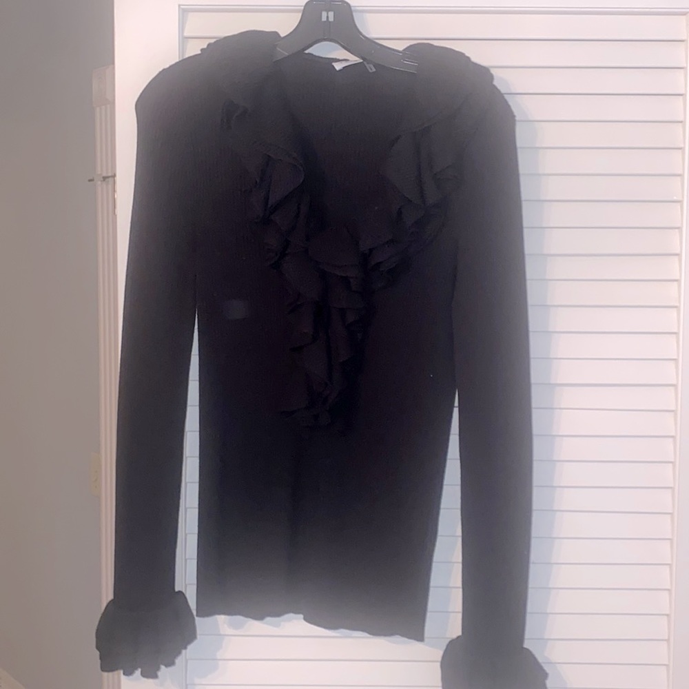 Nice ruffled pullover sweater.